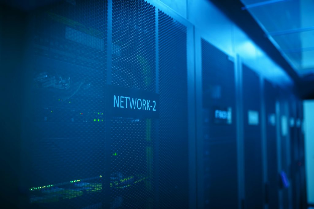 pexels-cookiecutter-17323801 Netzwerkschrank mit Serverinfrastruktur - Innovative IT Dienstleistungen für sichere Netzwerke und IT-Systeme